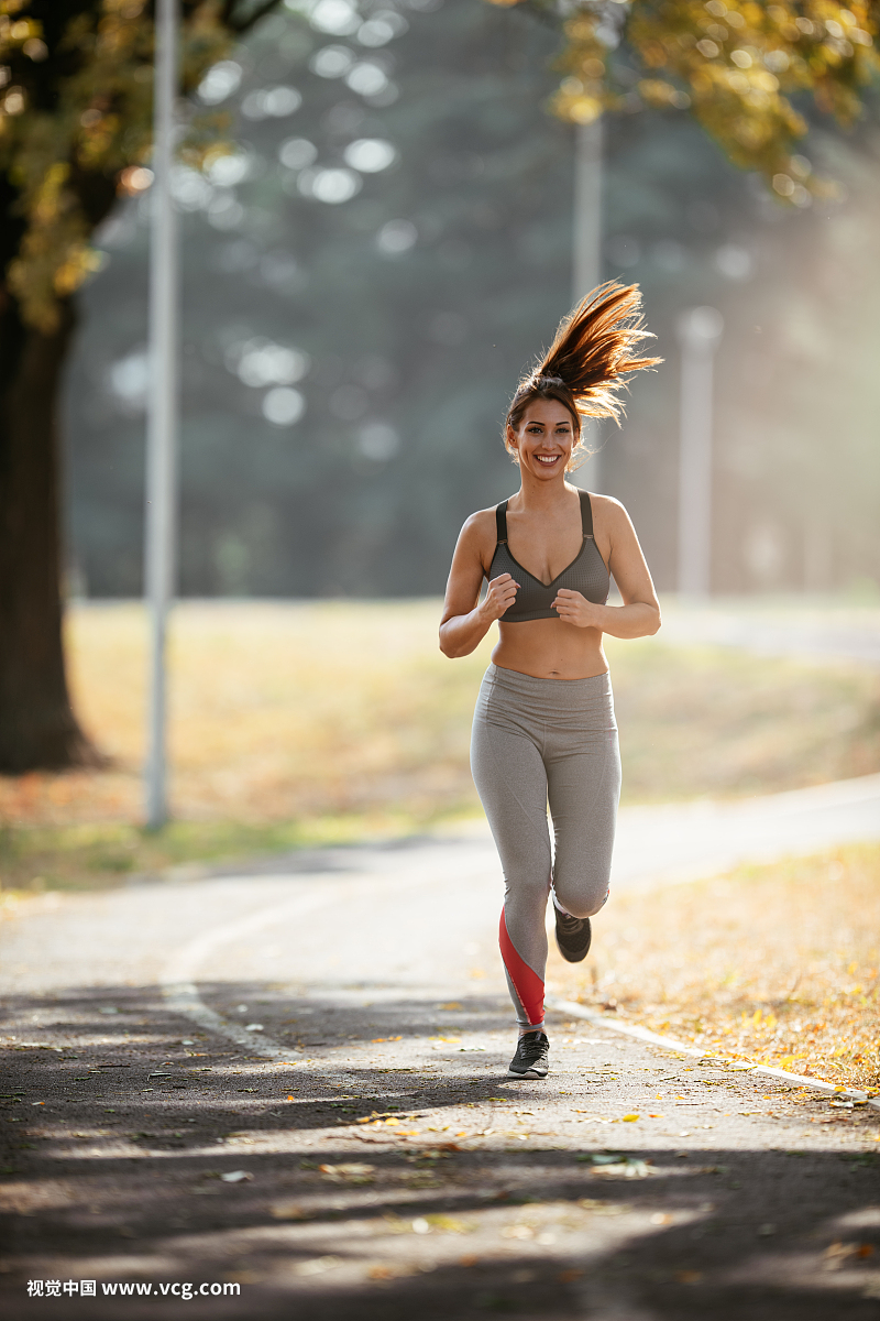 Young woman jogging in park